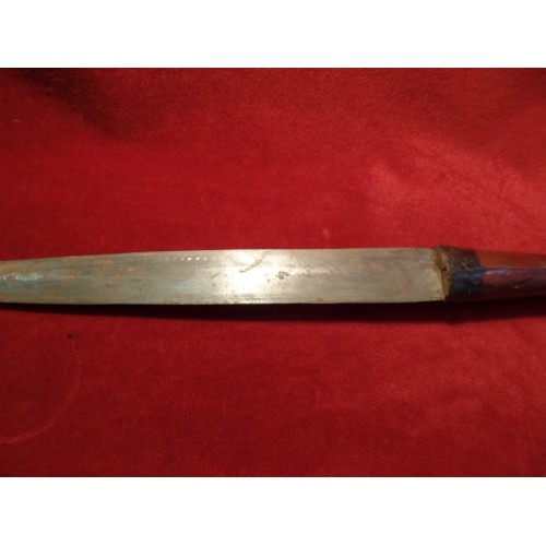 97 - A CIRCA 1930'S NIGERIAN ARM DAGGER WITH LEATHER COVERED HILT AND SCABBARD. PLAITED, TOOLED AND PAINT... 