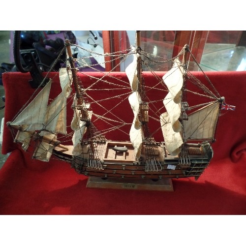 101 - A VINTAGE WOODEN MODEL OF NELSON'S FLAGSHIP HMS VICTORY - 50CM X 45CM