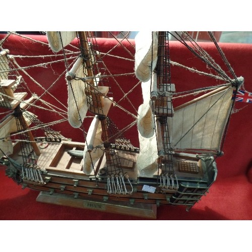 101 - A VINTAGE WOODEN MODEL OF NELSON'S FLAGSHIP HMS VICTORY - 50CM X 45CM