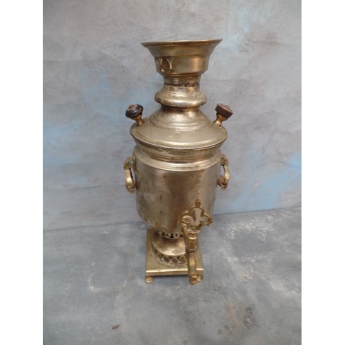 105 - A 20TH CENTURY MIDDLE EASTERN SAMOVAR WITH WOODEN HANDLES - 48CM H, TOGETHER WITH A LARGE MIDDLE EAS... 