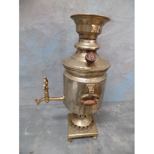 105 - A 20TH CENTURY MIDDLE EASTERN SAMOVAR WITH WOODEN HANDLES - 48CM H, TOGETHER WITH A LARGE MIDDLE EAS... 