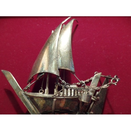 24 - A MIDDLE EASTERN SILVER MODEL OF A DHOW OR BGHLAH SAILING BOAT - FROM OMAN, LATE 20TH CENTURY  - THE... 