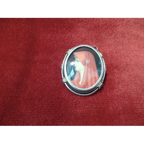 56 - A CIRCA 1930'S FRENCH SILVER (800) BROOCH PENDANT WITH A HAND PAINTED PANEL OF SAINT FABIOLA, PATRON... 