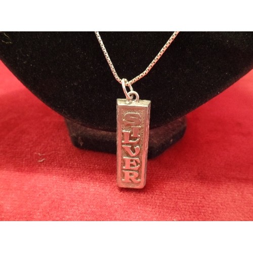 56C - A SILVER INGOT ON SILVER CHAIN MARKED SILVER WEIGHT 31.85gr