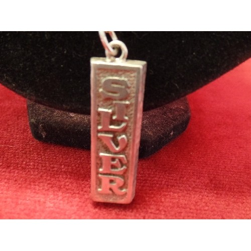 56C - A SILVER INGOT ON SILVER CHAIN MARKED SILVER WEIGHT 31.85gr