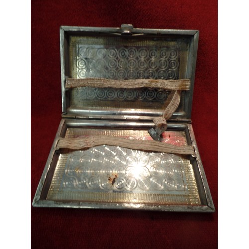 35K - TWO ANGLO INDIAN CIGARETTE CASES, CIRCA 1930's. BOTH  SILVER PLATED WITH HAND ENGRAVINGS OF THE TAJ ... 