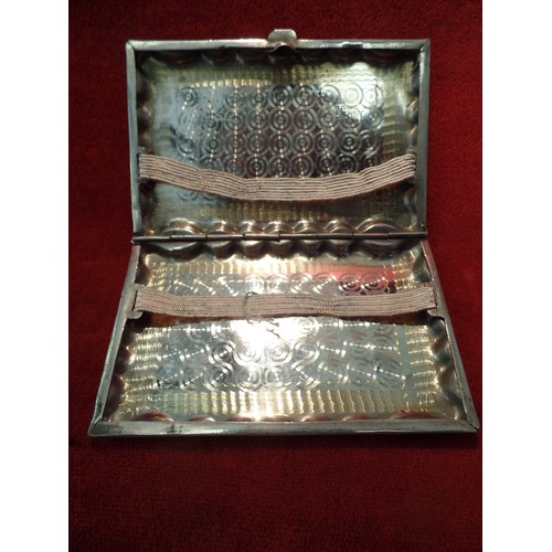 35K - TWO ANGLO INDIAN CIGARETTE CASES, CIRCA 1930's. BOTH  SILVER PLATED WITH HAND ENGRAVINGS OF THE TAJ ... 