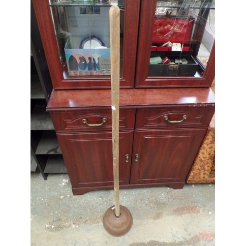 297 - VINTAGE COPPER WASH DOLLY WITH LONG WOODEN HANDLE.