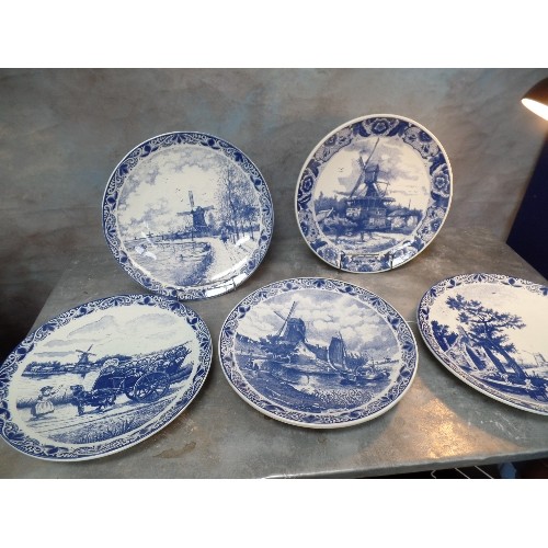 298 - A SUPERB SET OF FIVE LARGE 20TH CENTURY DELFT BLAUW CHARGER PLATES, ALL WITH DUTCH SCENES - 39CM DIA... 