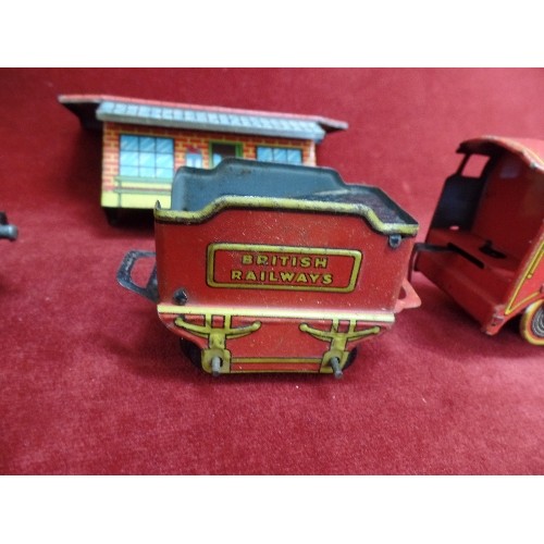 85 - VINTAGE TIN-PLATE TRAIN ENGINES, BUILDING AND TRACK.