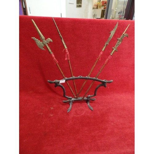 90 - SMALL DECORATIVE TRIBAL SPEARS ON A FRAME. 1 MISSING.