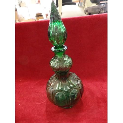 141 - EMERALD GREEN GLASS DRESSING TABLE SET. INCLUDES CANDLESTICKS, LIDDED POTS AND A RING TREE. TOGETHER... 