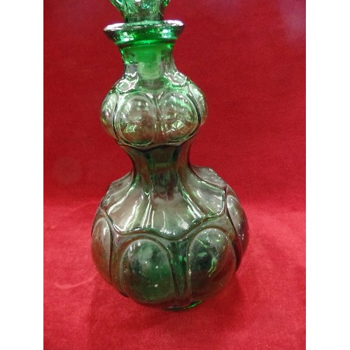 141 - EMERALD GREEN GLASS DRESSING TABLE SET. INCLUDES CANDLESTICKS, LIDDED POTS AND A RING TREE. TOGETHER... 