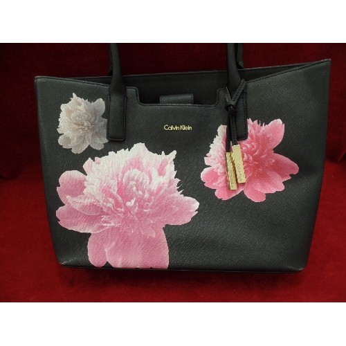 143 - 'CALVIN KLEIN' TOTE BAG. BLACK WITH PINK PEONIE DESIGN.