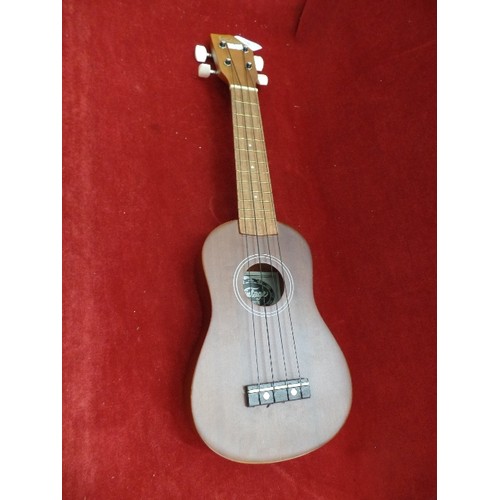 146 - UKELELE BY 'VINTAGE' VUK20N. STRINGS COMPLETE. ALSO CARRY BAG.