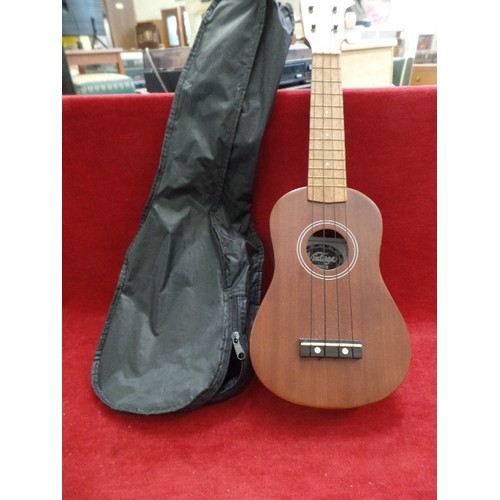 146 - UKELELE BY 'VINTAGE' VUK20N. STRINGS COMPLETE. ALSO CARRY BAG.