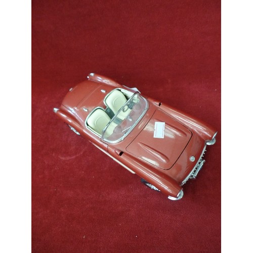 174 - BURAGO DIE-CAST SCALE MODEL. CHEVROLET CORVETTE 1957, IN METALLIC COPPER, WITH CREAM INTERIOR AND TR... 