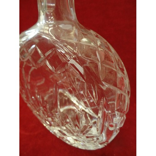 176 - CUT-GLASS DECANTER WITH STOPPER. FLAT CIRCULAR SHAPE.