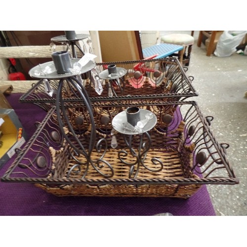 179 - 2 METAL & CANE STORAGE BASKETS, TOGETHER WITH 2 PAIRS OF METAL CANDLE HOLDERS.