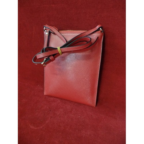 270 - SMALL RED BAG, WITH 'KAREN MILLEN' INNER LABEL.