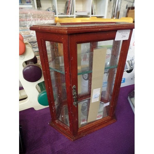 259 - TINY DISPLAY CABINET WITH GLASS SHELVES..