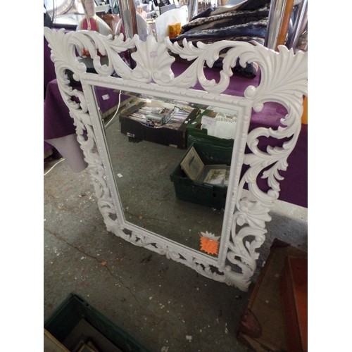 242 - LARGE WALL MIRROR WITH HIGH-GLOSS WHITE SCROLL FRAME. BEVELLED GLASS.