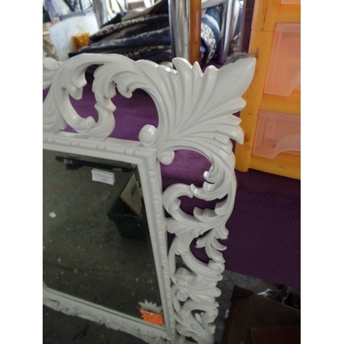 242 - LARGE WALL MIRROR WITH HIGH-GLOSS WHITE SCROLL FRAME. BEVELLED GLASS.