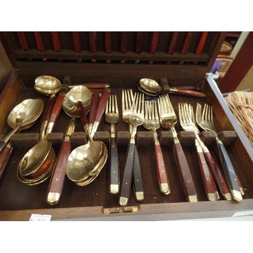 379 - BRONZE CANTEEN OF CUTLERY. WOODEN HANDLES. MADE IN THAILAND. WOODEN CASE.