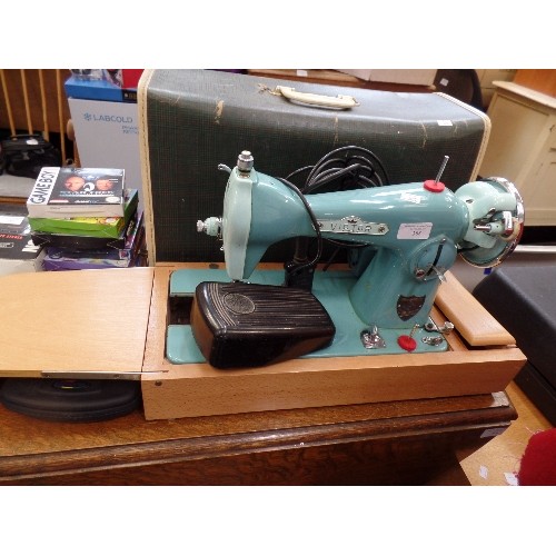 388 - VINTAGE 'VICTOR AUTO-SEW' SEWING MACHINE IN A BEAUTIFUL TURQUOISE COLOUR. ELECTRIC- FOOT PEDAL. WITH... 