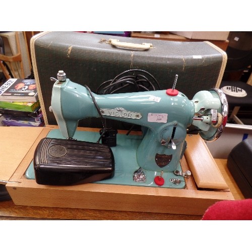 388 - VINTAGE 'VICTOR AUTO-SEW' SEWING MACHINE IN A BEAUTIFUL TURQUOISE COLOUR. ELECTRIC- FOOT PEDAL. WITH... 