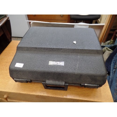 390 - LARGE VINTAGE WILDING TW1500E PROFESSIONAL TYPEWRITER. VERY HEAVY. IN CARRY CASE.