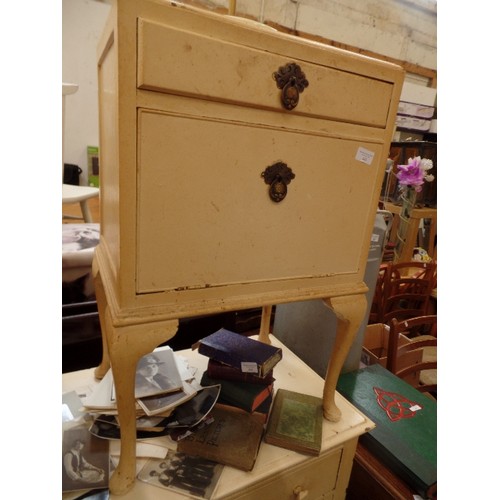 482 - SMALL CREAM PAINTED VINTAGE CABINET. PULL DOWN BOTTOM DOOR. TOP DRAWER. CABRIOLE LEGS. SMALL BRASS D... 