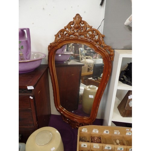 109 - LARGE WALL MIRROR WITH DECORATIVE CARVED FRAME.