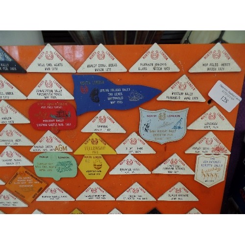 128 - RETRO-VINTAGE CARAVAN RALLY BADGES. DISPLAYED ON ORANGE PERSPEX BOARD.