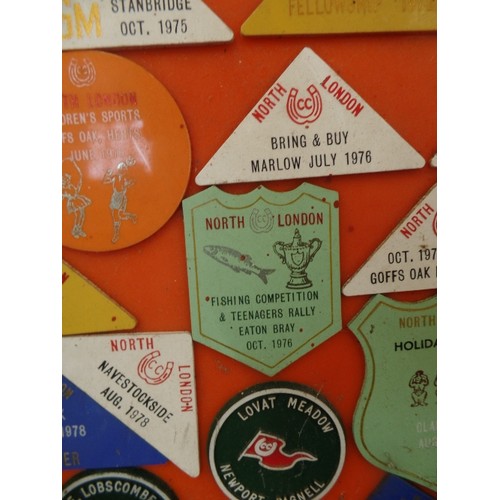 128 - RETRO-VINTAGE CARAVAN RALLY BADGES. DISPLAYED ON ORANGE PERSPEX BOARD.