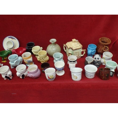 229 - MIXED VINTAGE, MAINLY EGG-CUPS, INC MYOTT, WEDGEWOOD PETER RABBIT ETC. ALSO A LIDDED COTTAGE JAM POT... 