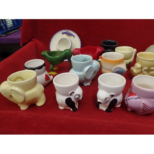 229 - MIXED VINTAGE, MAINLY EGG-CUPS, INC MYOTT, WEDGEWOOD PETER RABBIT ETC. ALSO A LIDDED COTTAGE JAM POT... 