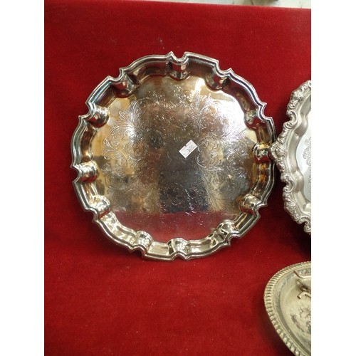 288 - VINTAGE OVAL SILVER-PLATED TRAY CONTAINING SMALLER TRAYS, CANDLESTICKS ETC.