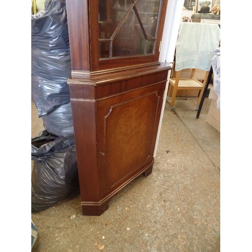 378 - TALL MAHOGANY CORNER DISPLAY UNIT, SECTIONAL GLASS DOOR. BOTTOM CUPBOARD.