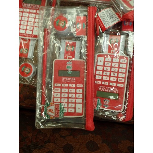 500 - BASKET OF NEW LIVERPOOL FC PENCIL CASES WITH CALCULATOR, RULER, ETC, AND PROGRAMMES, MAGAZINES ETC