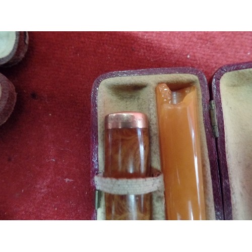 49 - 9CT GOLD AND AMBER CHEROOT HOLDER,AND 2 AMBER CHEROOT HOLDERS