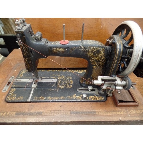 545 - VINTAGE FRISTER & ROSSMAN SEWING MACHINE IN CASE