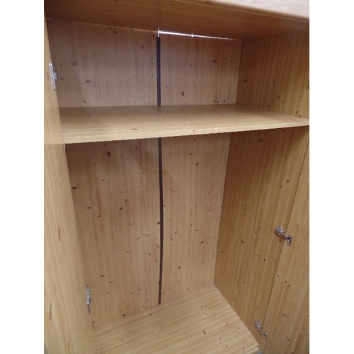 579 - PINE EFFECT TRIPLE WARDROBE WITH SHELVES