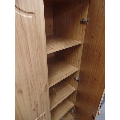 579 - PINE EFFECT TRIPLE WARDROBE WITH SHELVES