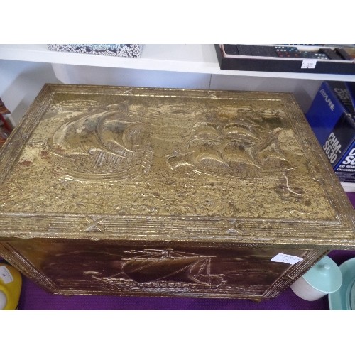 82 - VINTAGE BRASS COVERED COAL BOX. WITH RAISED GALLEON DETAIL.