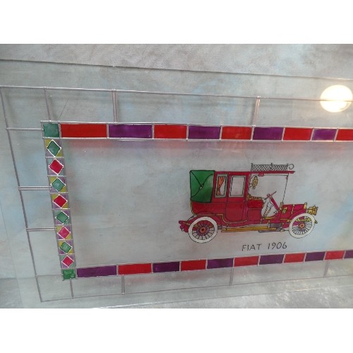 230 - PAINTED ENAMELLED AND LEADED GLASS PANEL DEPICTING A VINTAGE CAR - A 1906 FIAT - UNFRAMED - 79CM X 4... 