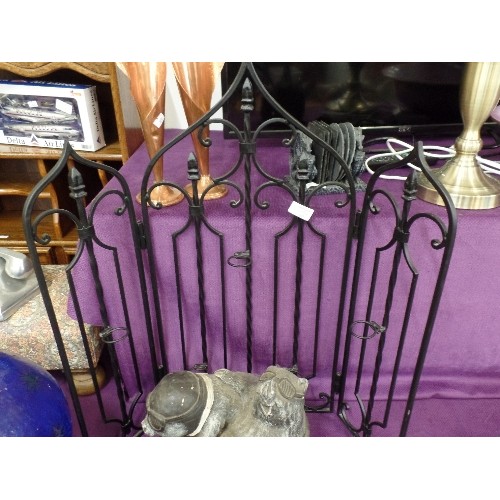 107 - LARGE DECORATIVE IRONWORK CANDLE HOLDER. BLACK PAINTED. 3-SIDED. FOLDS FLAT.