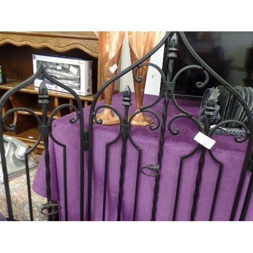 107 - LARGE DECORATIVE IRONWORK CANDLE HOLDER. BLACK PAINTED. 3-SIDED. FOLDS FLAT.