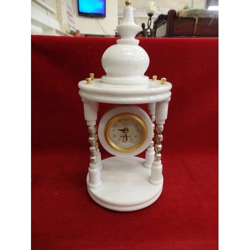 129 - CLOCK ON HEAVY WHITE MARBLE TEMPLE STAND WITH BRASS DETAILING. QUARTZ.