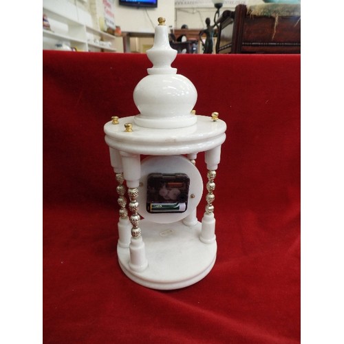 129 - CLOCK ON HEAVY WHITE MARBLE TEMPLE STAND WITH BRASS DETAILING. QUARTZ.